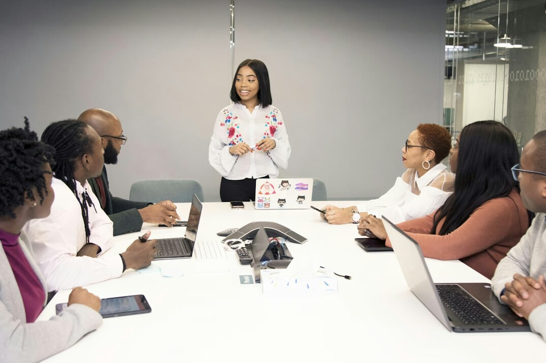 professional woman leading meeting