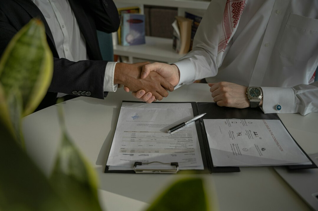 business people negotiating table